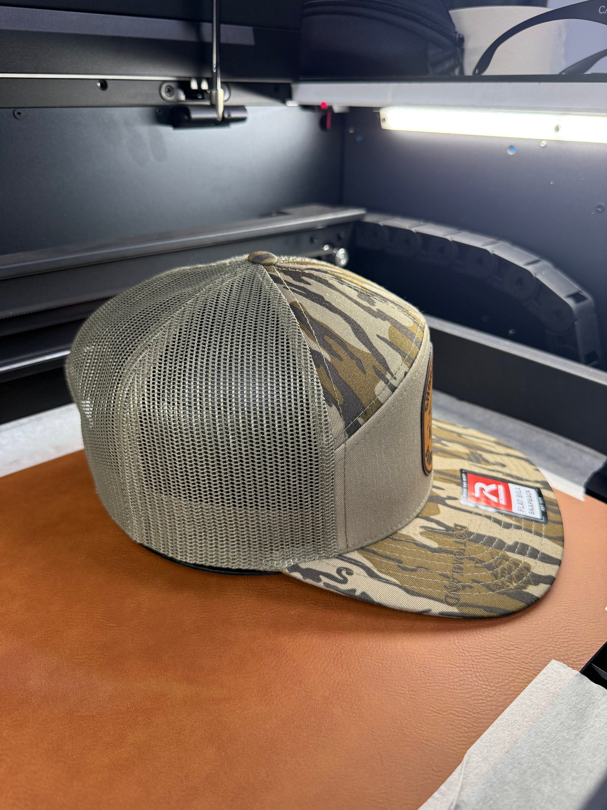 Lines and Dimes Mossy Oak Rawhide Leather Patch Hat