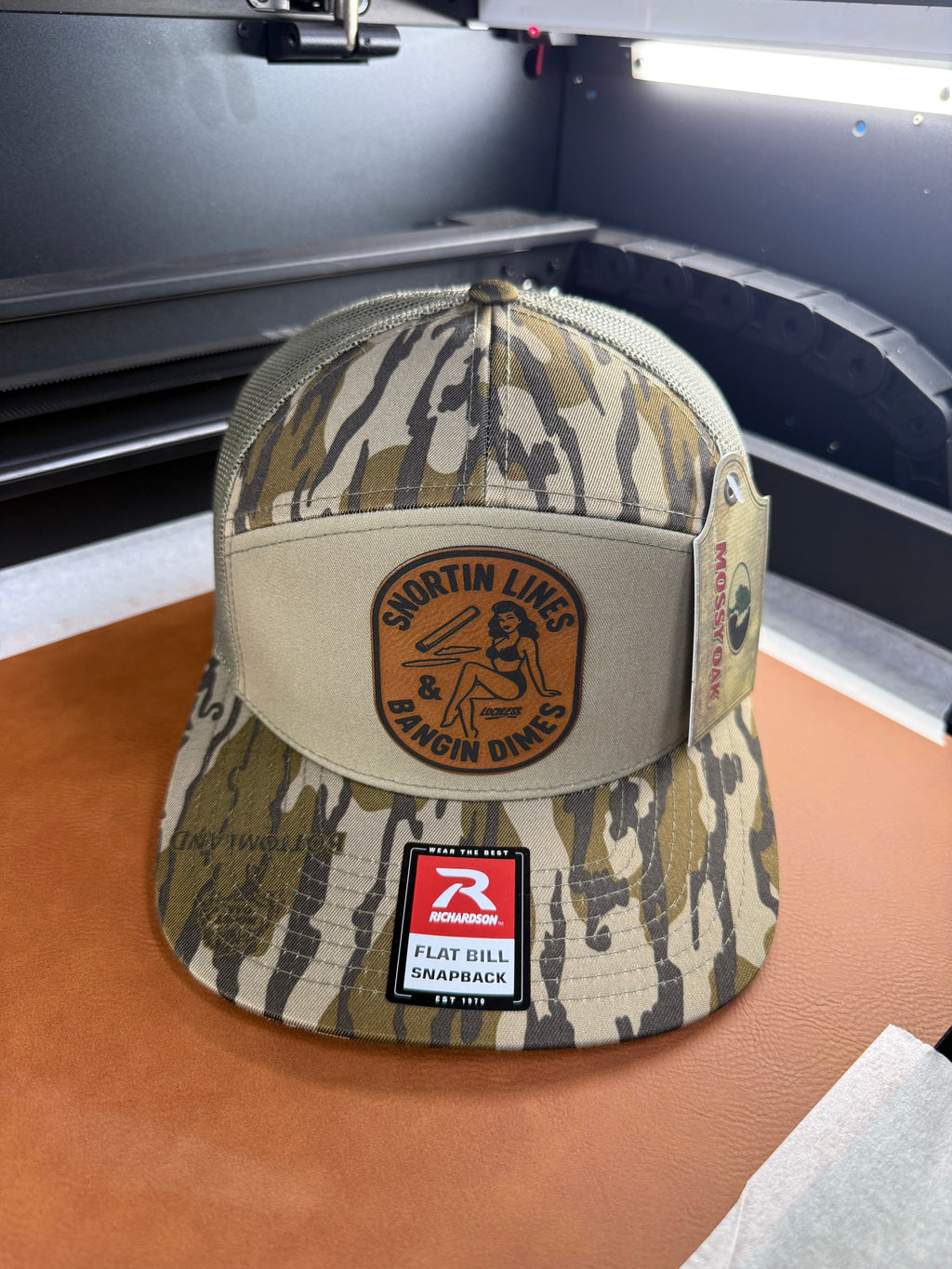 Lines and Dimes Mossy Oak Rawhide Leather Patch Hat