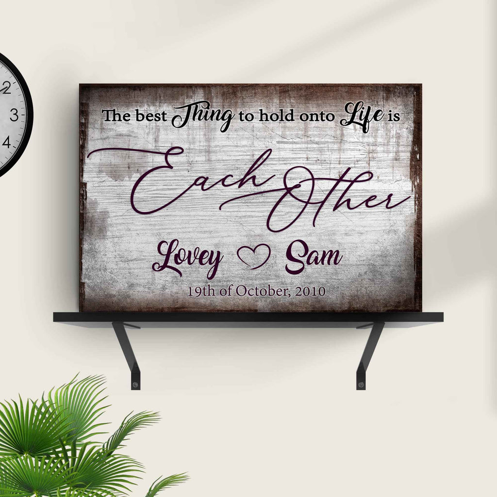 The Best Thing To Hold Onto Life Is Each Other Sign II