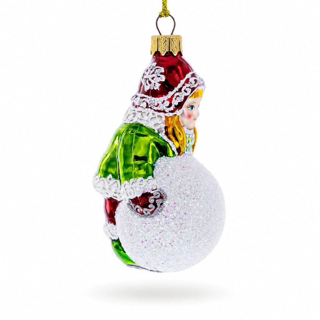 Girl Making a Snowball Glass Christmas Ornament