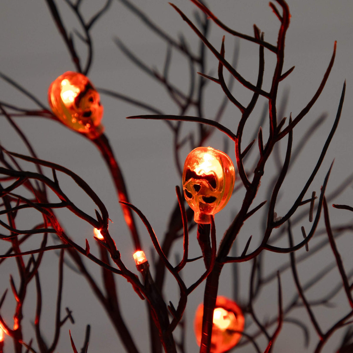 22" Pre-Lit Artificial Halloween Brown Twig Tree with 12 Orange LED Pumpkin Shaped Lights